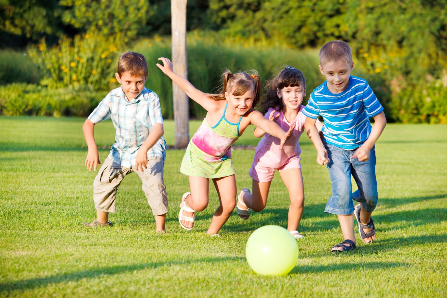 happy kids playing sports